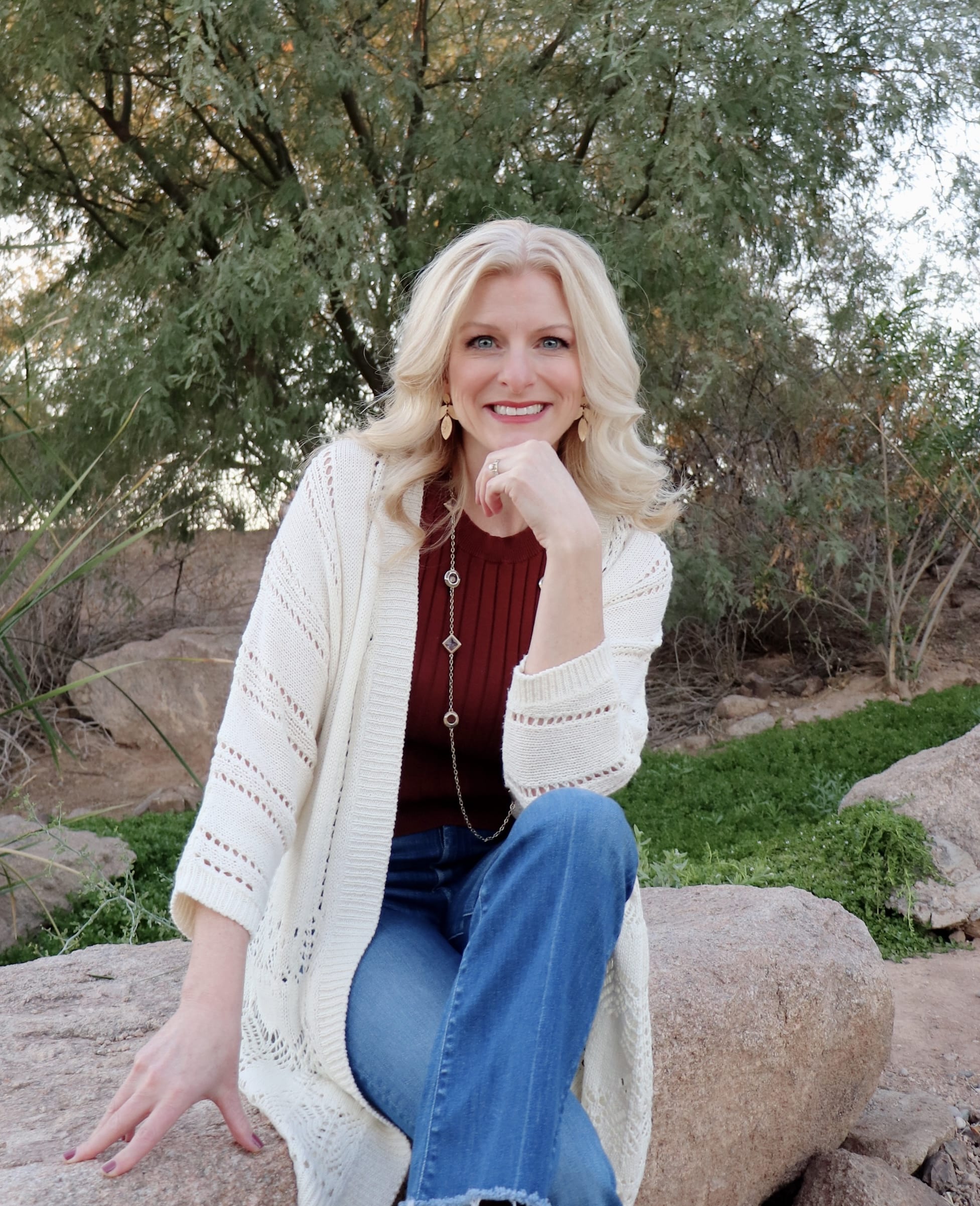 picture of Ginger Tabot sitting on rock at park